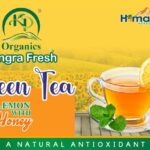 “Lemon and honey green tea bags with vibrant yellow and green accents”