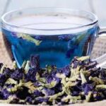 “A cup of vibrant blue tea made from butterfly pea flowers.”